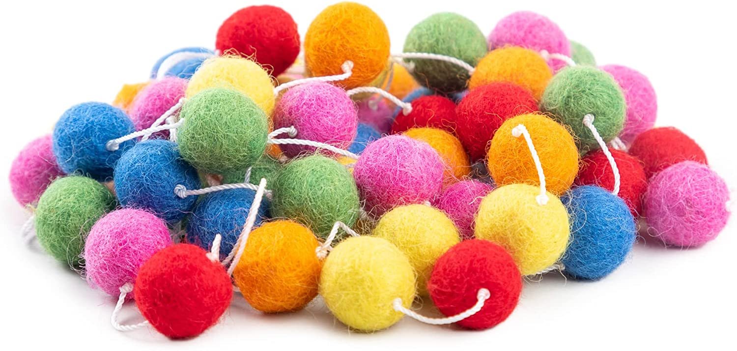 A playful garland strung with large, fluffy felt balls.