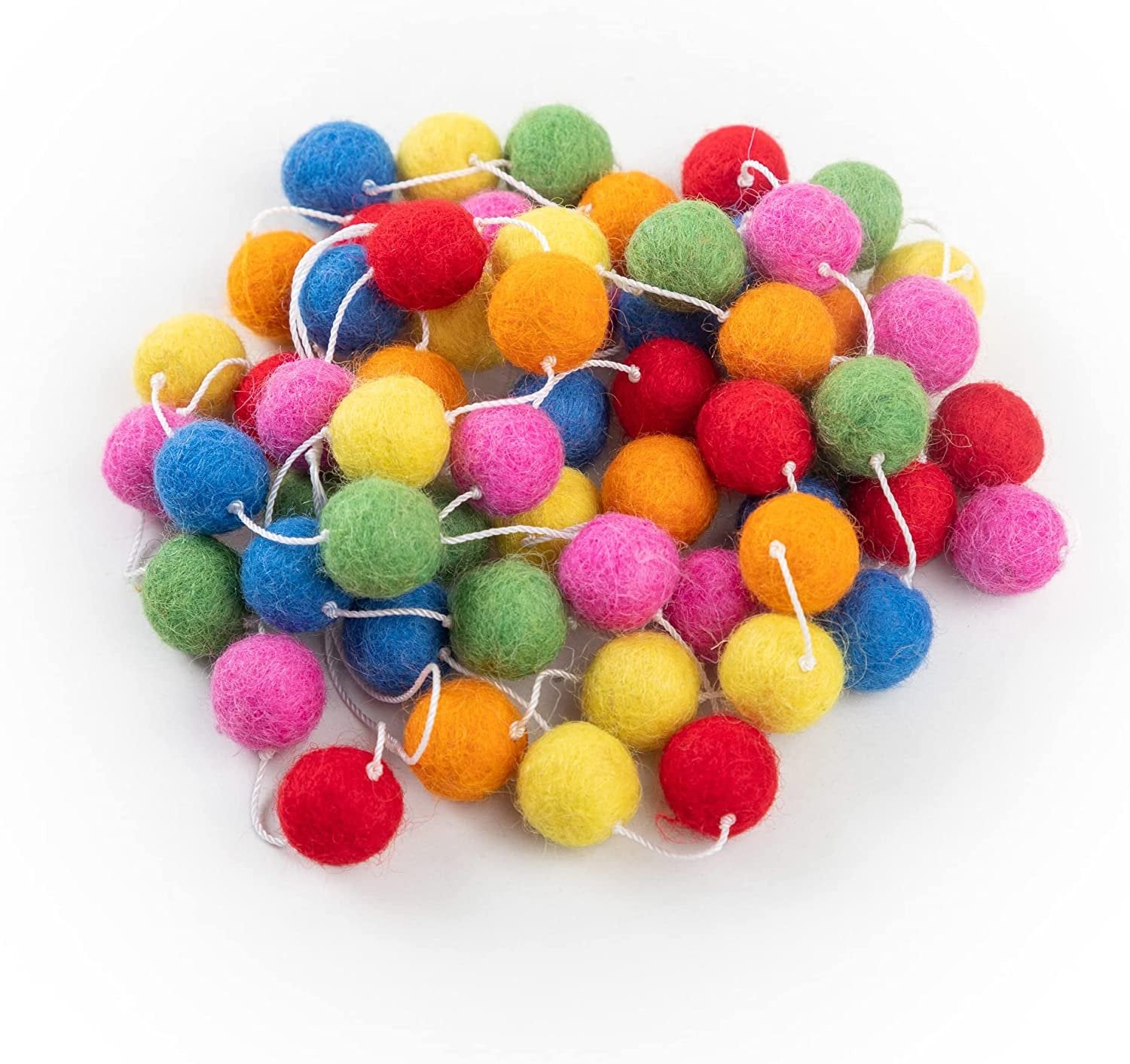 A playful garland strung with large, fluffy felt balls.